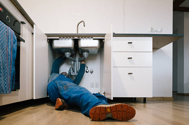 Professional Drain Cleaning technician working in Westport, IN